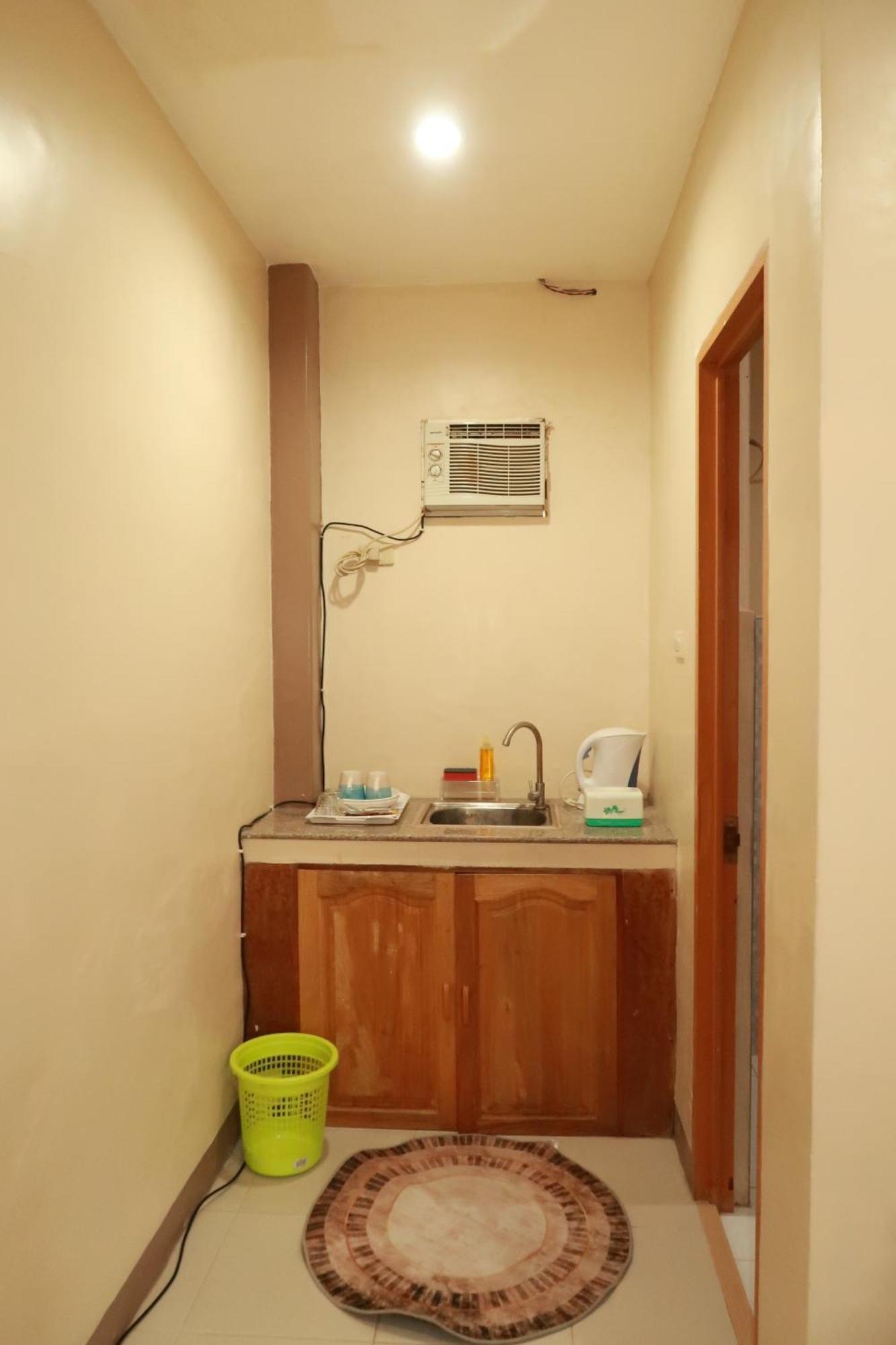 Jo-Cris Apartelle Мактан Экстерьер фото